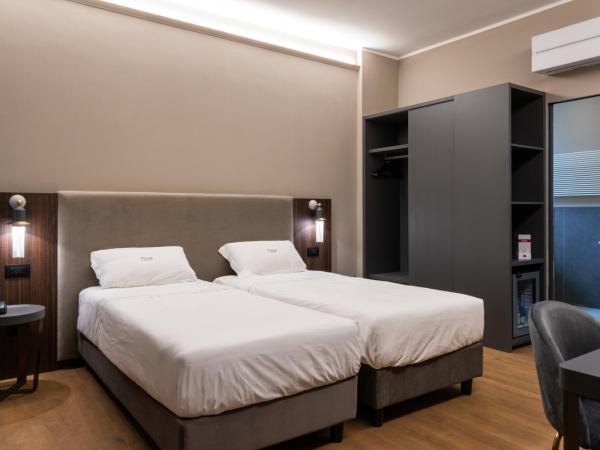 Hotel Touring : photo 2 de la chambre chambre triple