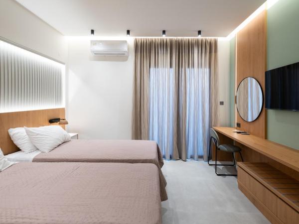 Arocaria Apartments : photo 7 de la chambre chambre lits jumeaux deluxe