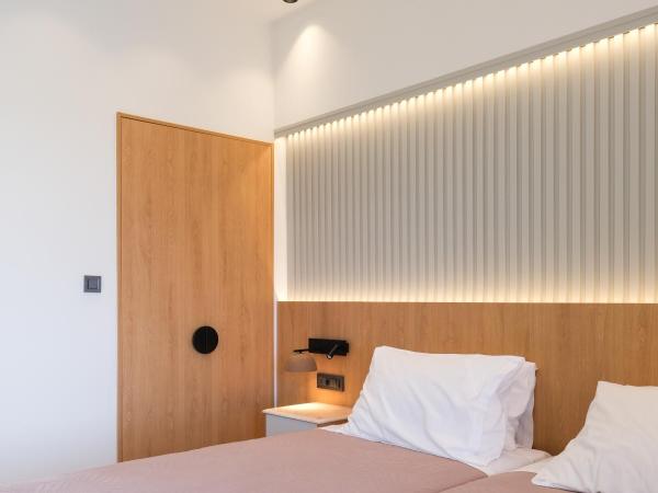 Arocaria Apartments : photo 10 de la chambre chambre lits jumeaux deluxe - vue sur mer