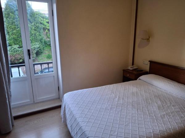 Hotel Capital de Galicia : photo 3 de la chambre chambre double ou lits jumeaux
