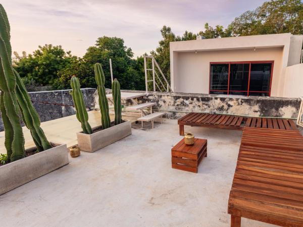 Casa Tuch. Suites independientes de diseño. Retiro de lujo, oasis de paz. : photo 3 de la chambre chambre double deluxe avec balcon