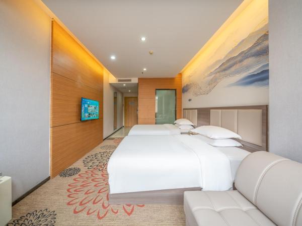 Meicheng Hotel - Guangzhou Huangpu Nangang Times City : photo 3 de la chambre chambre lits jumeaux supérieure