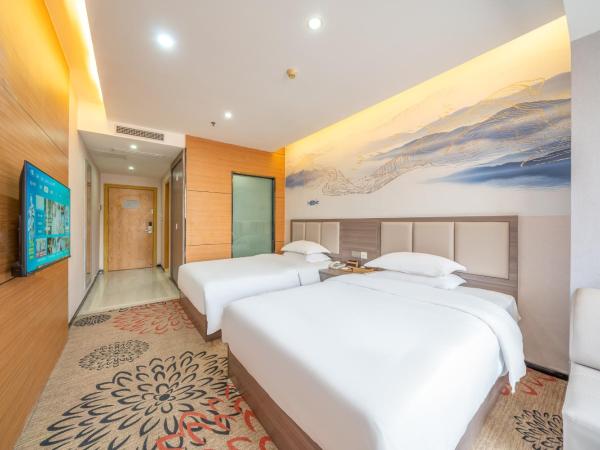 Meicheng Hotel - Guangzhou Huangpu Nangang Times City : photo 1 de la chambre chambre lits jumeaux supérieure