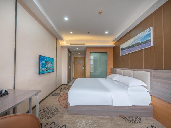 Meicheng Hotel - Guangzhou Huangpu Nangang Times City : photo 1 de la chambre chambre lit king-size supérieure