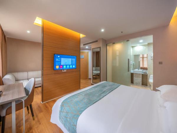 Meicheng Hotel - Guangzhou Huangpu Nangang Times City : photo 2 de la chambre suite supérieure