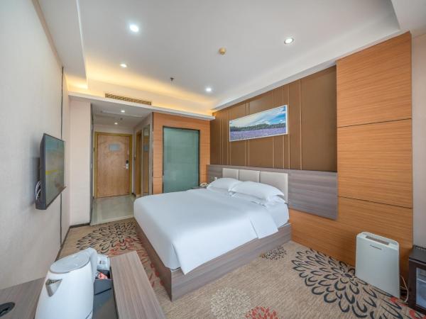 Meicheng Hotel - Guangzhou Huangpu Nangang Times City : photo 2 de la chambre chambre lit king-size supérieure
