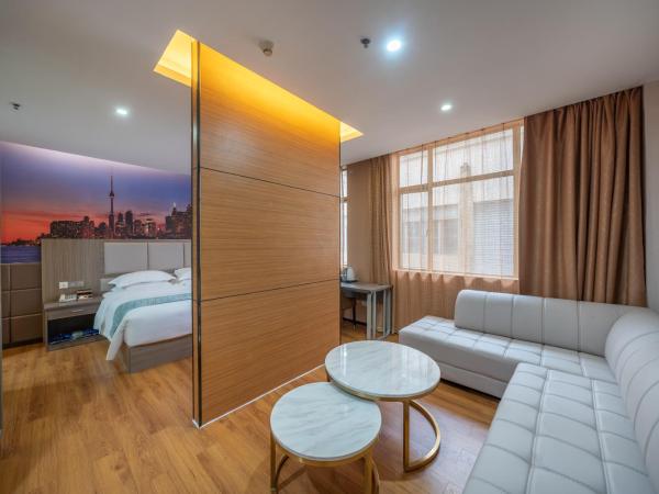 Meicheng Hotel - Guangzhou Huangpu Nangang Times City : photo 1 de la chambre suite supérieure