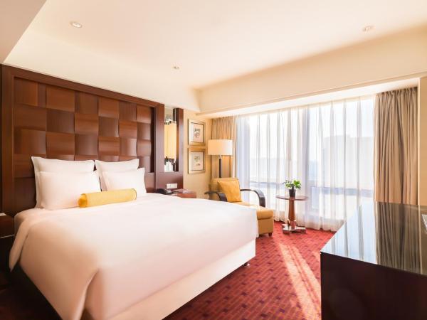 Beijing Pudi Hotel : photo 2 de la chambre suite exécutive