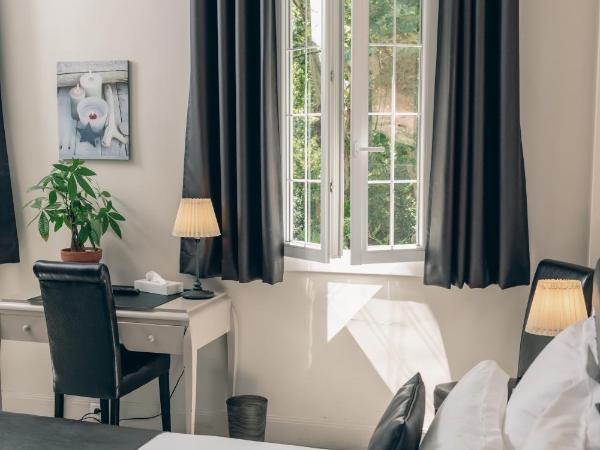 Auberge de la Treille - Chambres d'Hôtes : photo 1 de la chambre chambre lit king-size - vue sur jardin