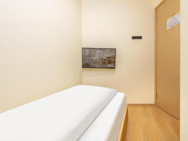 Lemon Hotel - Metro Line 1 Line 7 Changshu Road 200 meters : photo 8 de la chambre special single room - shared bathroom no window