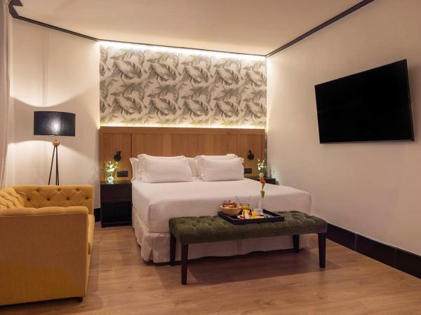 H10 Puerta de Alcalá : photo 1 de la chambre chambre deluxe (2 adultes + 1 enfant)