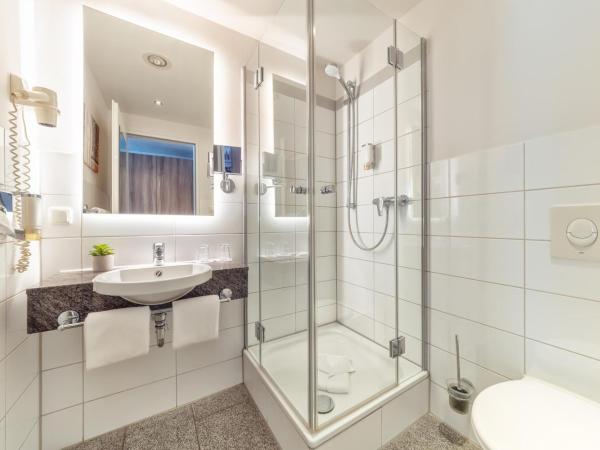 CityClass Hotel am Dom : photo 6 de la chambre chambre double supérieure - vue sur cathédrale