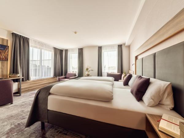 CityClass Hotel am Dom : photo 6 de la chambre suite junior avec terrasse - vue sur cathédrale