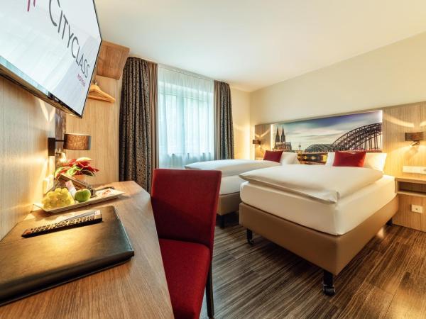 CityClass Hotel am Heumarkt : photo 1 de la chambre chambre lits jumeaux confort