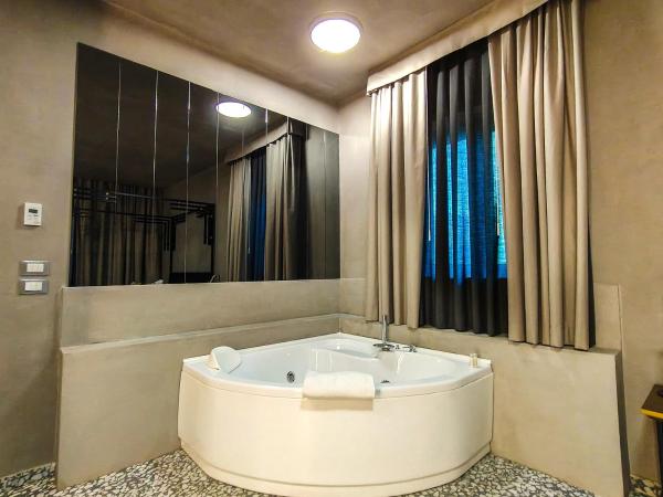 Hotel Nuvò : photo 2 de la chambre chambre double deluxe avec baignoire