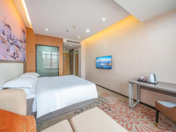 Meicheng Hotel - Guangzhou Huangpu Nangang Times City : photo 5 de la chambre grande chambre lit king-size