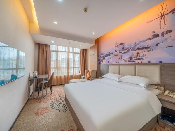 Meicheng Hotel - Guangzhou Huangpu Nangang Times City : photo 4 de la chambre grande chambre lit king-size