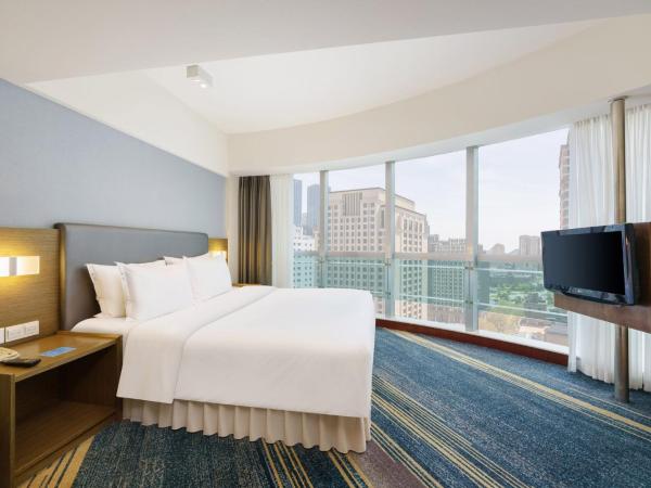 Holiday Inn Express City Centre Dalian, an IHG Hotel : photo 5 de la chambre suite lit king-size