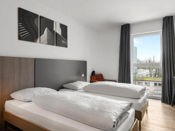 SMARTments connect FRANKFURT CITY-OST : photo 1 de la chambre chambre lits jumeaux classique