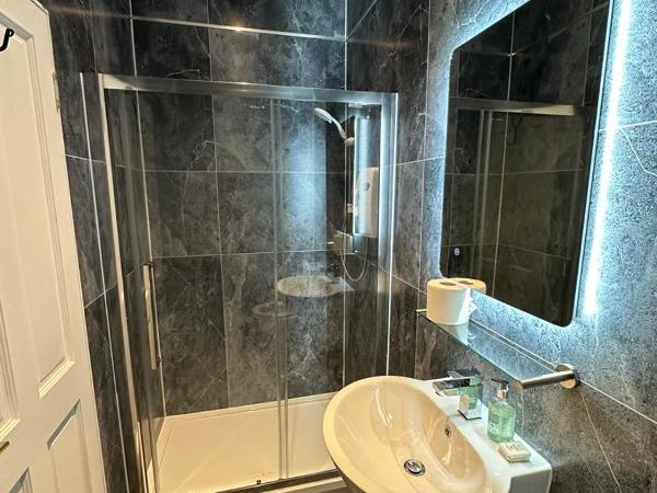 Kildonan Lodge Hotel : photo 2 de la chambre chambre familiale - vue sur jardin