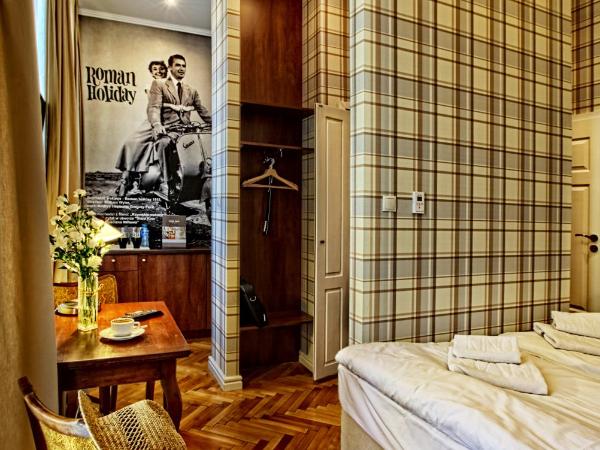 Stare Kino Cinema Residence : photo 10 de la chambre appartement avec lit double