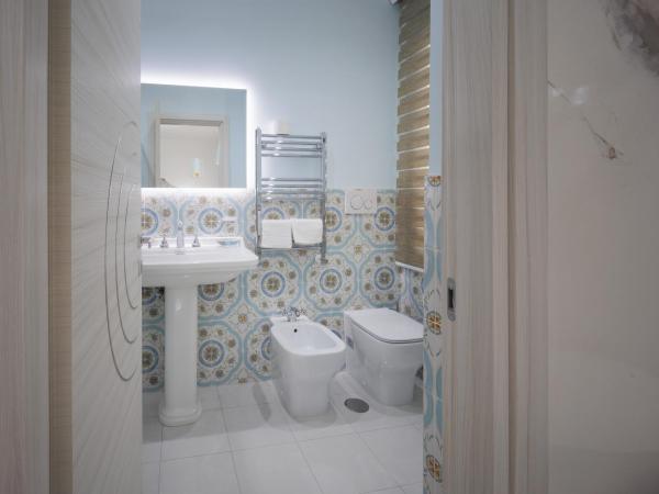 REDDIMUS Guest House : photo 10 de la chambre chambre double deluxe avec baignoire