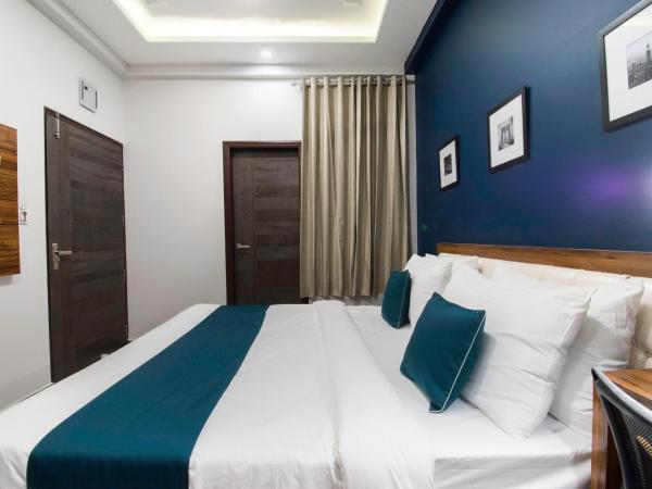 Collection O Hotel Blue Shine : photo 4 de la chambre chambre double standard