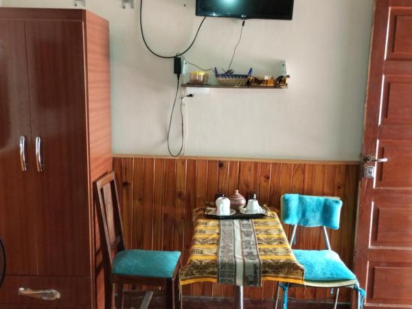 Lo de Su : photo 1 de la chambre chambre triple avec salle de bains commune