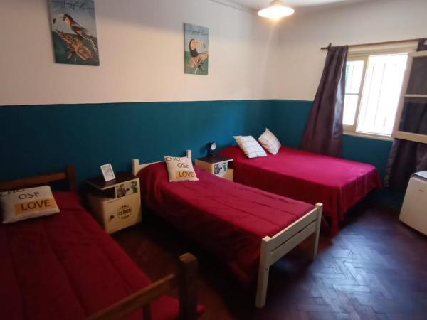 Hostal El Encuentro : photo 3 de la chambre chambre quadruple Économique avec salle de bains commune