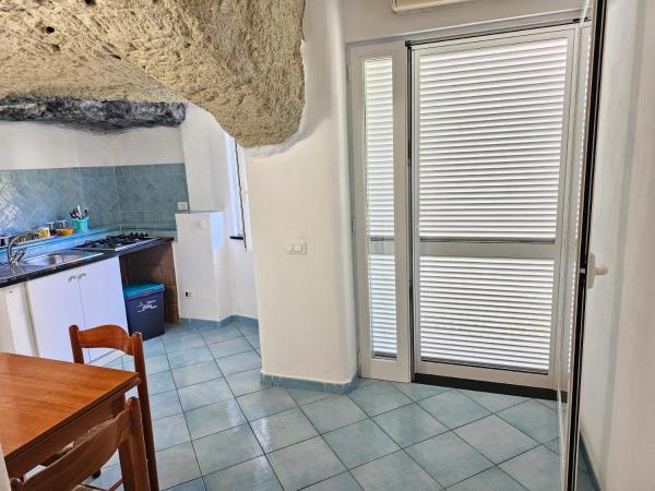 Paco Residence Benessere & Relax : photo 7 de la chambre appartement - vue sur jardin