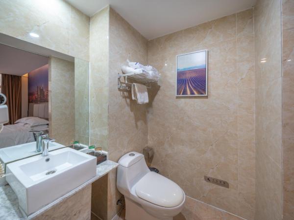 Meicheng Hotel - Guangzhou Huangpu Nangang Times City : photo 5 de la chambre suite supérieure