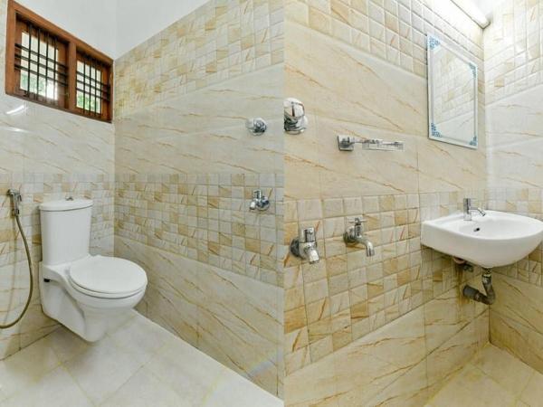 Malabar Plaza INN : photo 2 de la chambre chambre deluxe