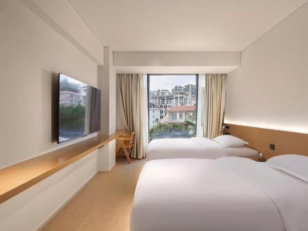 Yolo Vacation Homestay : photo 3 de la chambre chambre lits jumeaux classique