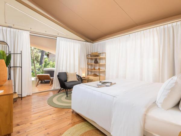 Arena One 99 Glamping : photo 7 de la chambre suite deluxe grande Évasion