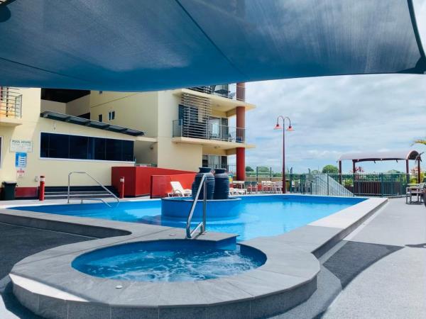 Cullen Bay Resorts : photo 1 de la chambre standard one bedroom apartment includes free parking & wifi