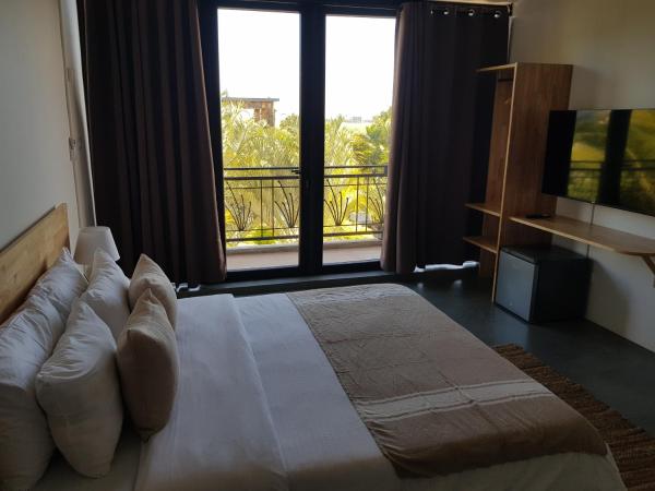 Villas Rocher - Standard Suite 3A : photo 9 de la chambre chambre standard lit queen-size