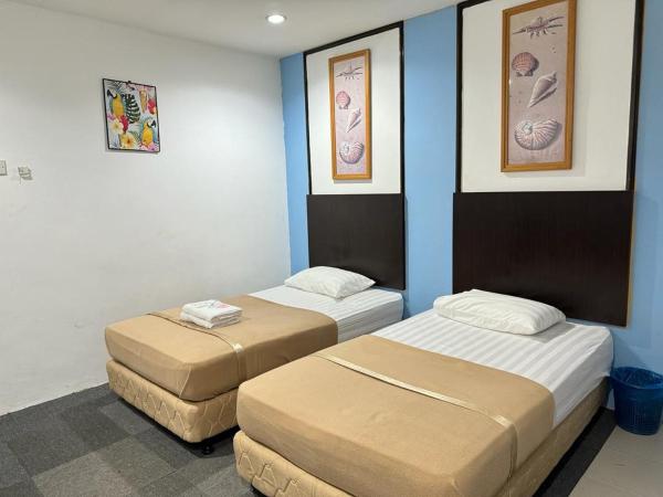 Shangg INN : photo 4 de la chambre chambre lits jumeaux deluxe