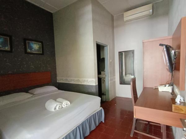 Ndalem Mantrigawen : photo 3 de la chambre chambre double standard