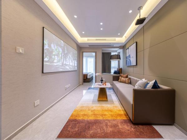 Excellence International Apartment - Convention & Exhibition Center : photo 6 de la chambre light luxury audio-visual one-bedroom and one-bathroom [72-inch projection + tencent membership + large refrigerator + washing machine