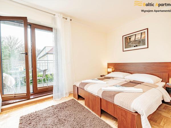 Baltic Apartments - Hotelik Przy Promenadzie : photo 1 de la chambre chambre double avec balcon