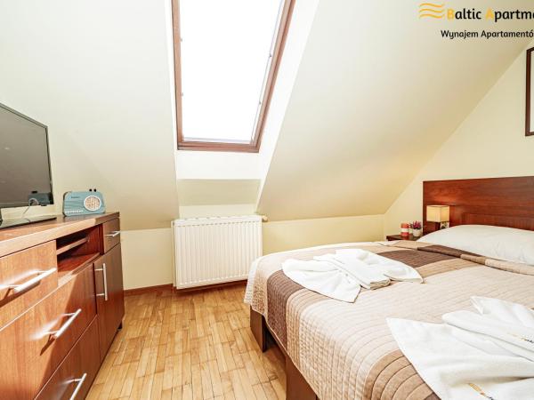 Baltic Apartments - Hotelik Przy Promenadzie : photo 2 de la chambre appartement