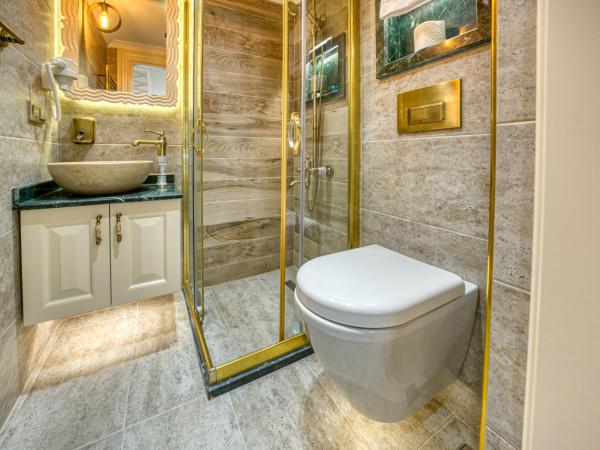 Mahhsen Mansion Oldcity : photo 8 de la chambre chambre triple avec salle de bains privative