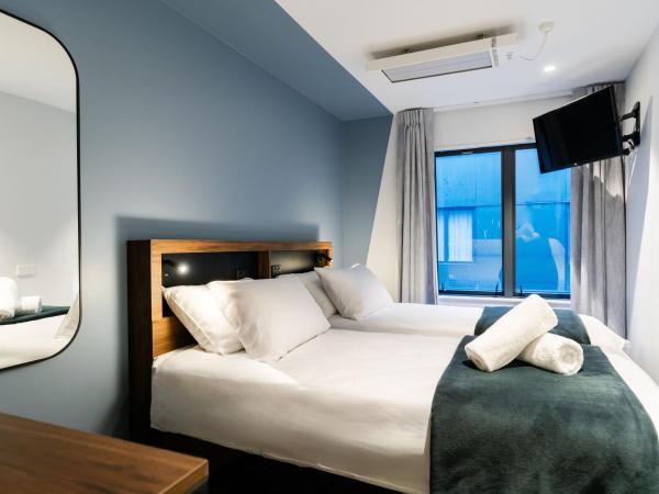 Haka House Wellington : photo 3 de la chambre chambre lits jumeaux avec salle de bains privative