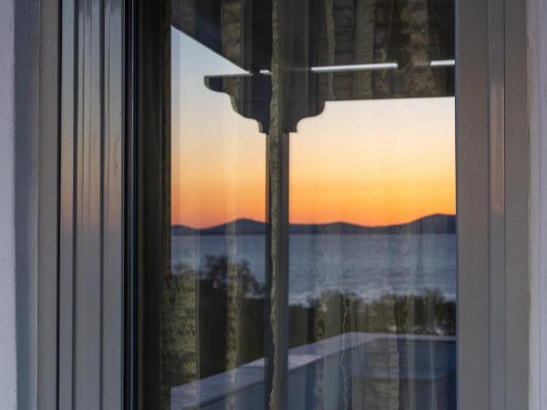 Kymata Hotel : photo 2 de la chambre chambre quadruple - vue sur mer