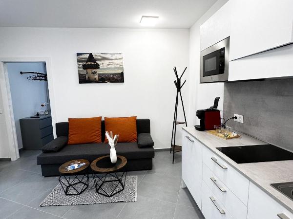 Grazora Living Apartments : photo 3 de la chambre suite supérieure lit king-size