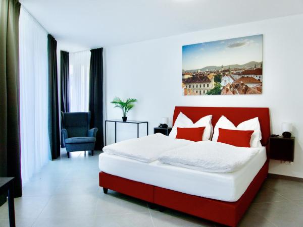 Grazora Living Apartments : photo 2 de la chambre chambre lit king-size supérieure