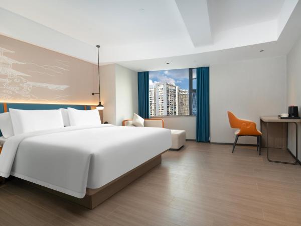 Yizhi Hotel Changgang Metro Station - Free Shuttle Bus during Canton Fair : photo 2 de la chambre chambre affaires lit queen-size