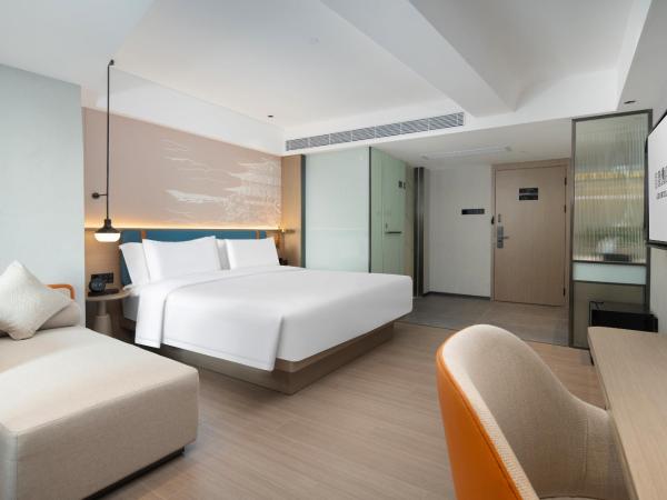 Yizhi Hotel Changgang Metro Station - Free Shuttle Bus during Canton Fair : photo 3 de la chambre chambre affaires lit queen-size