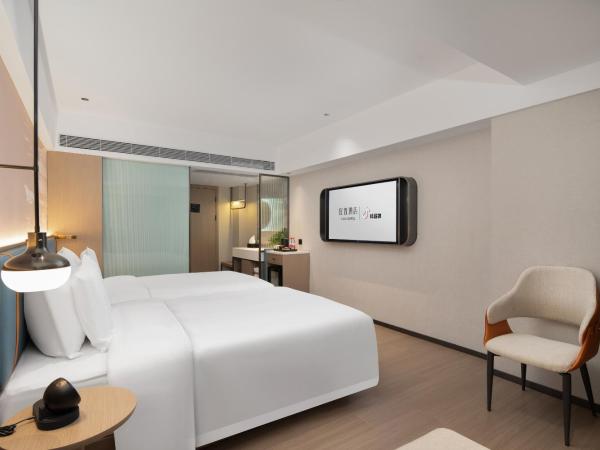 Yizhi Hotel Changgang Metro Station - Free Shuttle Bus during Canton Fair : photo 2 de la chambre chambre lits jumeaux standard