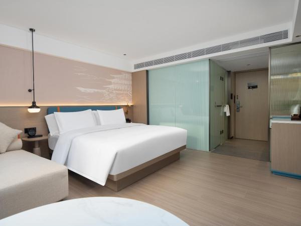 Yizhi Hotel Changgang Metro Station - Free Shuttle Bus during Canton Fair : photo 5 de la chambre chambre lit queen-size deluxe